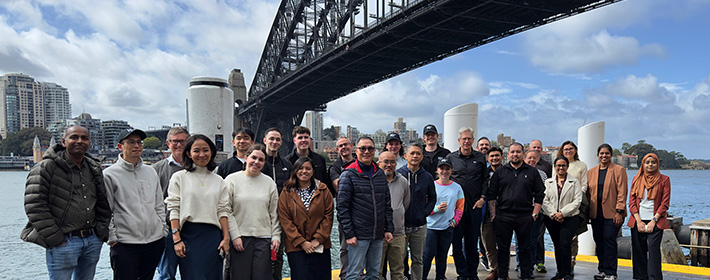 IQX Business Solutions team at Inspire 2025 with Sydney Opera House